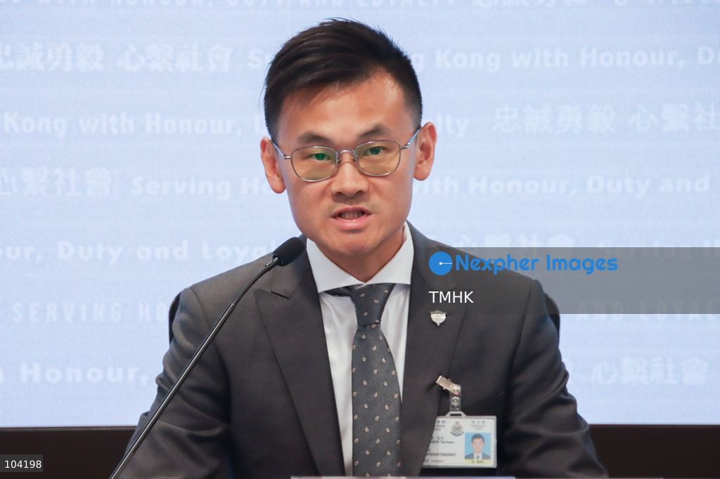 Superintendent Chow Tsz-hin of the Organised Crime and Triad Bureau briefs reporters on a police operation targeting an alleged non-ethnic Chinese criminal syndicate involved in loan sharking and illegal gambling in Hong Kong on October 10, 2026. (Photo by Gordon Choi/TMHK via Nexpher Images)