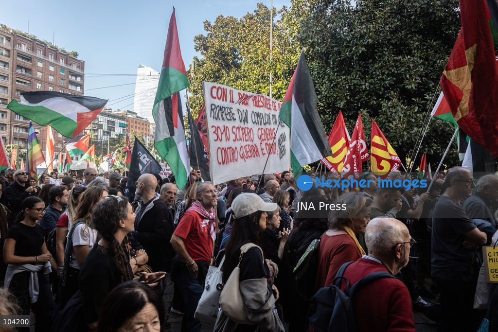 MILAN, ITALY, OCTOBER 10, 2026: Thousands of demonstrators march through central Milan in solidarity with Palestinians, marking three years since the start of the war in Gaza. Protesters carry Palestinian flags, banners and placards as they march from Piazza della Repubblica toward Piazza San Babila, calling for an end to Israel's military operations in Gaza, an arms embargo and the suspension of agreements with Israel. The demonstration was part of a nationwide mobilization organized by Palestinian groups and supporting organizations across Italy. Photo by Nadia Caimi / JNA Press. (Photo by Nadia Caimi/JNA Press via Nexpher Images)