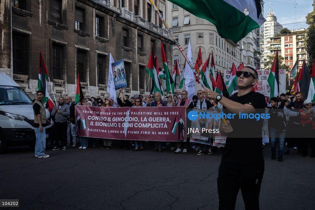MILAN, ITALY, OCTOBER 10, 2026: Thousands of demonstrators march through central Milan in solidarity with Palestinians, marking three years since the start of the war in Gaza. Protesters carry Palestinian flags, banners and placards as they march from Piazza della Repubblica toward Piazza San Babila, calling for an end to Israel's military operations in Gaza, an arms embargo and the suspension of agreements with Israel. The demonstration was part of a nationwide mobilization organized by Palestinian groups and supporting organizations across Italy. Photo by Nadia Caimi / JNA Press. (Photo by Nadia Caimi/JNA Press via Nexpher Images)