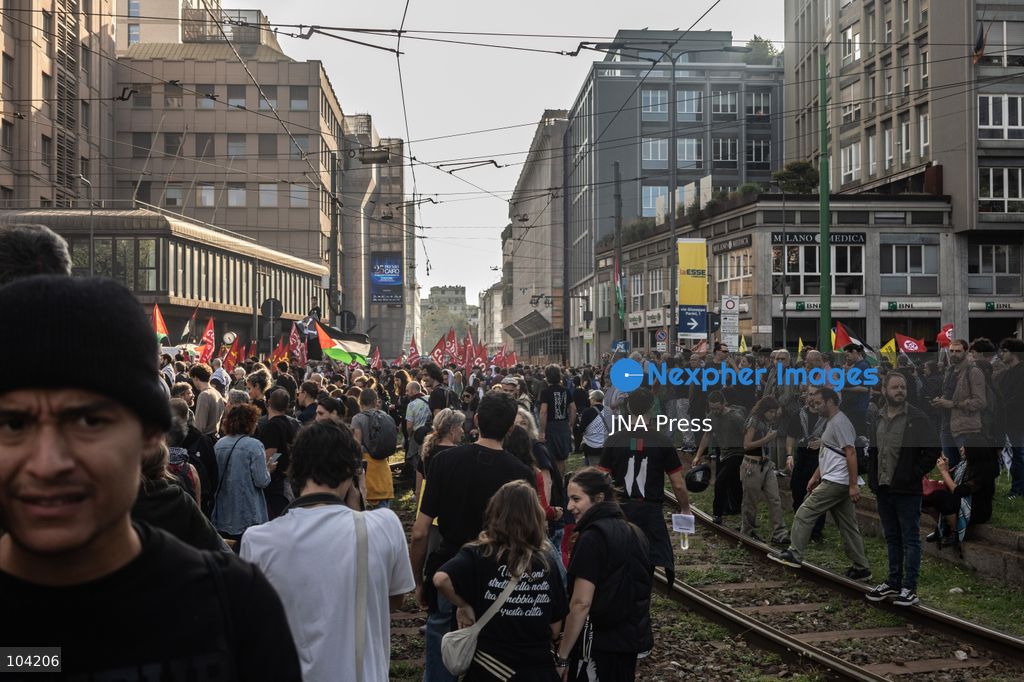 MILAN, ITALY, OCTOBER 10, 2026: Thousands of demonstrators march through central Milan in solidarity with Palestinians, marking three years since the start of the war in Gaza. Protesters carry Palestinian flags, banners and placards as they march from Piazza della Repubblica toward Piazza San Babila, calling for an end to Israel's military operations in Gaza, an arms embargo and the suspension of agreements with Israel. The demonstration was part of a nationwide mobilization organized by Palestinian groups and supporting organizations across Italy. Photo by Nadia Caimi / JNA Press. (Photo by Nadia Caimi/JNA Press via Nexpher Images)