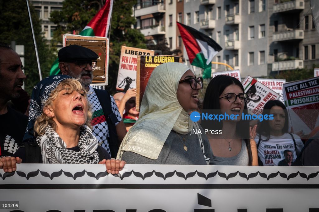 MILAN, ITALY, OCTOBER 10, 2026: Thousands of demonstrators march through central Milan in solidarity with Palestinians, marking three years since the start of the war in Gaza. Protesters carry Palestinian flags, banners and placards as they march from Piazza della Repubblica toward Piazza San Babila, calling for an end to Israel's military operations in Gaza, an arms embargo and the suspension of agreements with Israel. The demonstration was part of a nationwide mobilization organized by Palestinian groups and supporting organizations across Italy. Photo by Nadia Caimi / JNA Press. (Photo by Nadia Caimi/JNA Press via Nexpher Images)