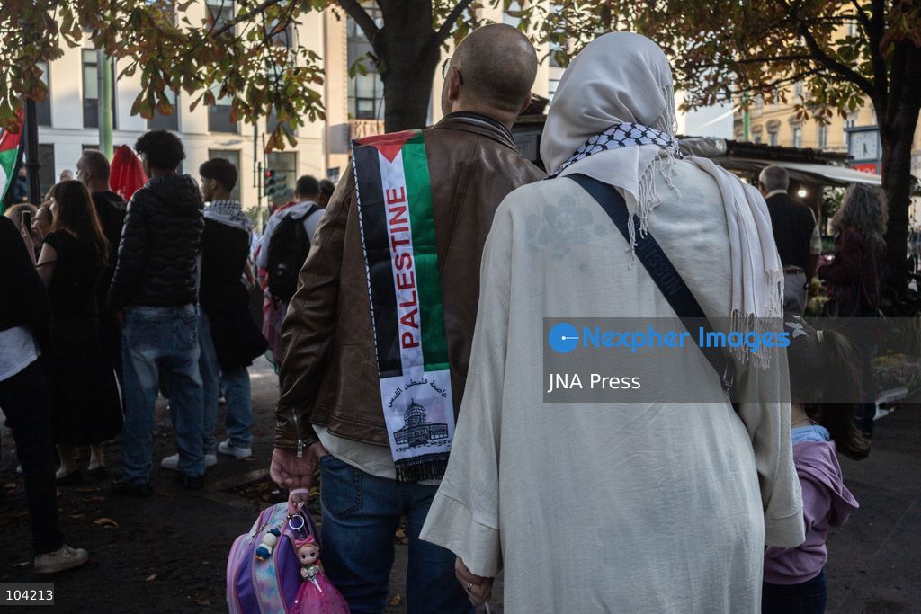 MILAN, ITALY, OCTOBER 10, 2026: Thousands of demonstrators march through central Milan in solidarity with Palestinians, marking three years since the start of the war in Gaza. Protesters carry Palestinian flags, banners and placards as they march from Piazza della Repubblica toward Piazza San Babila, calling for an end to Israel's military operations in Gaza, an arms embargo and the suspension of agreements with Israel. The demonstration was part of a nationwide mobilization organized by Palestinian groups and supporting organizations across Italy. Photo by Nadia Caimi / JNA Press. (Photo by Nadia Caimi/JNA Press via Nexpher Images)
