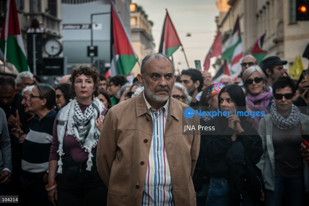 MILAN, ITALY, OCTOBER 10, 2026: Thousands of demonstrators march through central Milan in solidarity with Palestinians, marking three years since the start of the war in Gaza. Protesters carry Palestinian flags, banners and placards as they march from Piazza della Repubblica toward Piazza San Babila, calling for an end to Israel's military operations in Gaza, an arms embargo and the suspension of agreements with Israel. The demonstration was part of a nationwide mobilization organized by Palestinian groups and supporting organizations across Italy. Photo by Nadia Caimi / JNA Press. (Photo by Nadia Caimi/JNA Press via Nexpher Images)