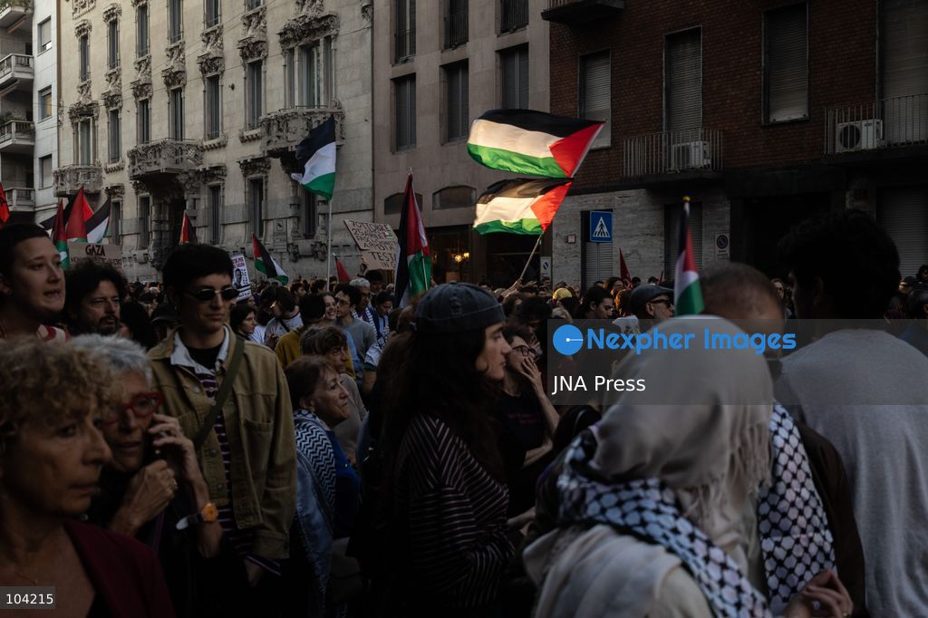 MILAN, ITALY, OCTOBER 10, 2026: Thousands of demonstrators march through central Milan in solidarity with Palestinians, marking three years since the start of the war in Gaza. Protesters carry Palestinian flags, banners and placards as they march from Piazza della Repubblica toward Piazza San Babila, calling for an end to Israel's military operations in Gaza, an arms embargo and the suspension of agreements with Israel. The demonstration was part of a nationwide mobilization organized by Palestinian groups and supporting organizations across Italy. Photo by Nadia Caimi / JNA Press. (Photo by Nadia Caimi/JNA Press via Nexpher Images)