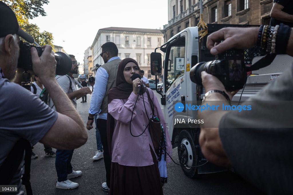 MILAN, ITALY, OCTOBER 10, 2026: Thousands of demonstrators march through central Milan in solidarity with Palestinians, marking three years since the start of the war in Gaza. Protesters carry Palestinian flags, banners and placards as they march from Piazza della Repubblica toward Piazza San Babila, calling for an end to Israel's military operations in Gaza, an arms embargo and the suspension of agreements with Israel. The demonstration was part of a nationwide mobilization organized by Palestinian groups and supporting organizations across Italy. Photo by Nadia Caimi / JNA Press. (Photo by Nadia Caimi/JNA Press via Nexpher Images)