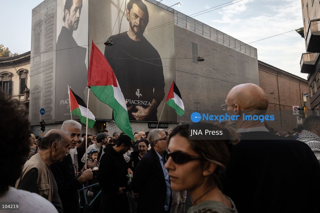 MILAN, ITALY, OCTOBER 10, 2026: Thousands of demonstrators march through central Milan in solidarity with Palestinians, marking three years since the start of the war in Gaza. Protesters carry Palestinian flags, banners and placards as they march from Piazza della Repubblica toward Piazza San Babila, calling for an end to Israel's military operations in Gaza, an arms embargo and the suspension of agreements with Israel. The demonstration was part of a nationwide mobilization organized by Palestinian groups and supporting organizations across Italy. Photo by Nadia Caimi / JNA Press. (Photo by Nadia Caimi/JNA Press via Nexpher Images)