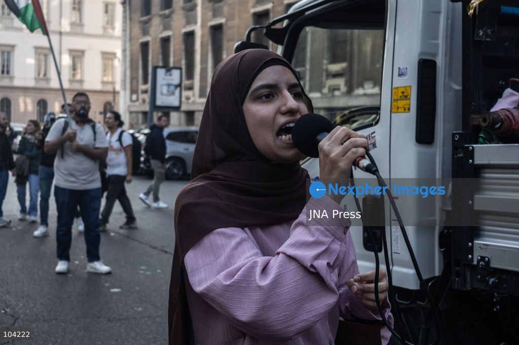 MILAN, ITALY, OCTOBER 10, 2026: Thousands of demonstrators march through central Milan in solidarity with Palestinians, marking three years since the start of the war in Gaza. Protesters carry Palestinian flags, banners and placards as they march from Piazza della Repubblica toward Piazza San Babila, calling for an end to Israel's military operations in Gaza, an arms embargo and the suspension of agreements with Israel. The demonstration was part of a nationwide mobilization organized by Palestinian groups and supporting organizations across Italy. Photo by Nadia Caimi / JNA Press. (Photo by Nadia Caimi/JNA Press via Nexpher Images)