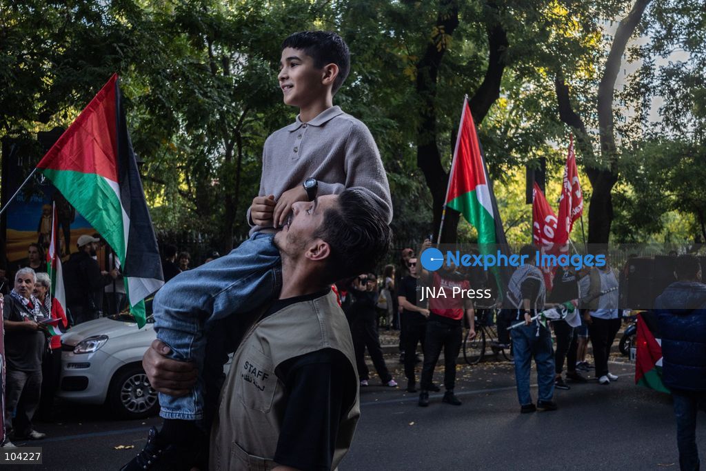 MILAN, ITALY, OCTOBER 10, 2026: Thousands of demonstrators march through central Milan in solidarity with Palestinians, marking three years since the start of the war in Gaza. Protesters carry Palestinian flags, banners and placards as they march from Piazza della Repubblica toward Piazza San Babila, calling for an end to Israel's military operations in Gaza, an arms embargo and the suspension of agreements with Israel. The demonstration was part of a nationwide mobilization organized by Palestinian groups and supporting organizations across Italy. Photo by Nadia Caimi / JNA Press. (Photo by Nadia Caimi/JNA Press via Nexpher Images)