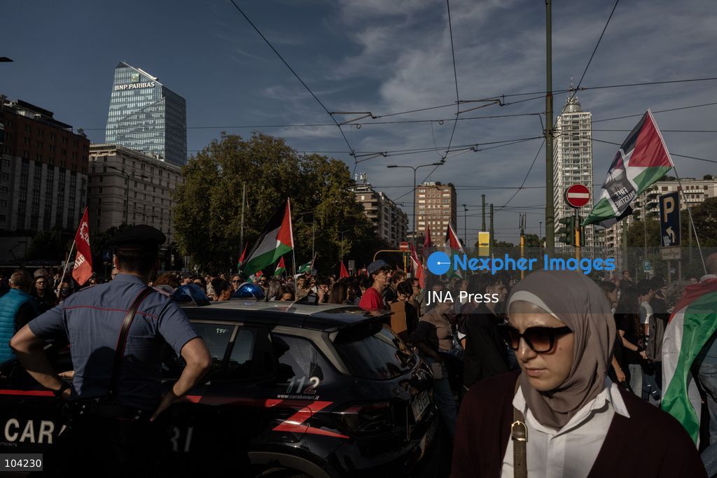 MILAN, ITALY, OCTOBER 10, 2026: Thousands of demonstrators march through central Milan in solidarity with Palestinians, marking three years since the start of the war in Gaza. Protesters carry Palestinian flags, banners and placards as they march from Piazza della Repubblica toward Piazza San Babila, calling for an end to Israel's military operations in Gaza, an arms embargo and the suspension of agreements with Israel. The demonstration was part of a nationwide mobilization organized by Palestinian groups and supporting organizations across Italy. Photo by Nadia Caimi / JNA Press. (Photo by Nadia Caimi/JNA Press via Nexpher Images)