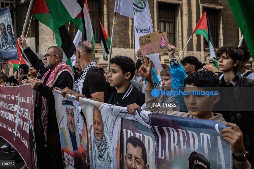 MILAN, ITALY, OCTOBER 10, 2026: Thousands of demonstrators march through central Milan in solidarity with Palestinians, marking three years since the start of the war in Gaza. Protesters carry Palestinian flags, banners and placards as they march from Piazza della Repubblica toward Piazza San Babila, calling for an end to Israel's military operations in Gaza, an arms embargo and the suspension of agreements with Israel. The demonstration was part of a nationwide mobilization organized by Palestinian groups and supporting organizations across Italy. Photo by Nadia Caimi / JNA Press. (Photo by Nadia Caimi/JNA Press via Nexpher Images)