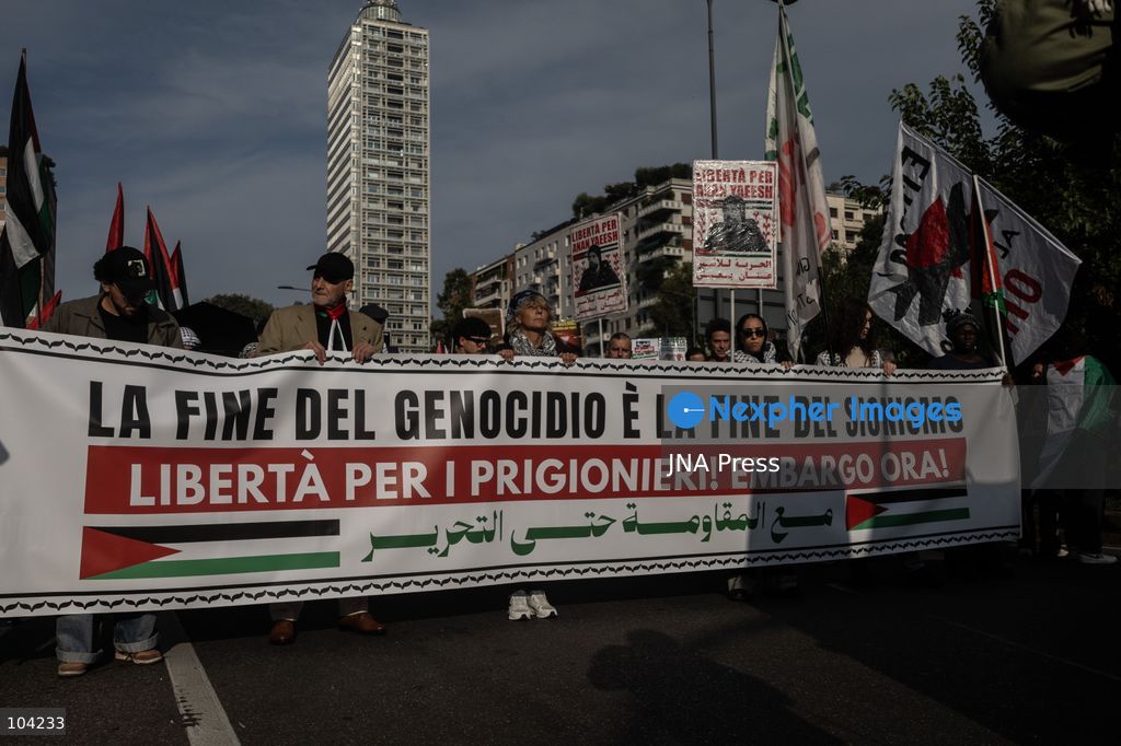 MILAN, ITALY, OCTOBER 10, 2026: Thousands of demonstrators march through central Milan in solidarity with Palestinians, marking three years since the start of the war in Gaza. Protesters carry Palestinian flags, banners and placards as they march from Piazza della Repubblica toward Piazza San Babila, calling for an end to Israel's military operations in Gaza, an arms embargo and the suspension of agreements with Israel. The demonstration was part of a nationwide mobilization organized by Palestinian groups and supporting organizations across Italy. Photo by Nadia Caimi / JNA Press. (Photo by Nadia Caimi/JNA Press via Nexpher Images)