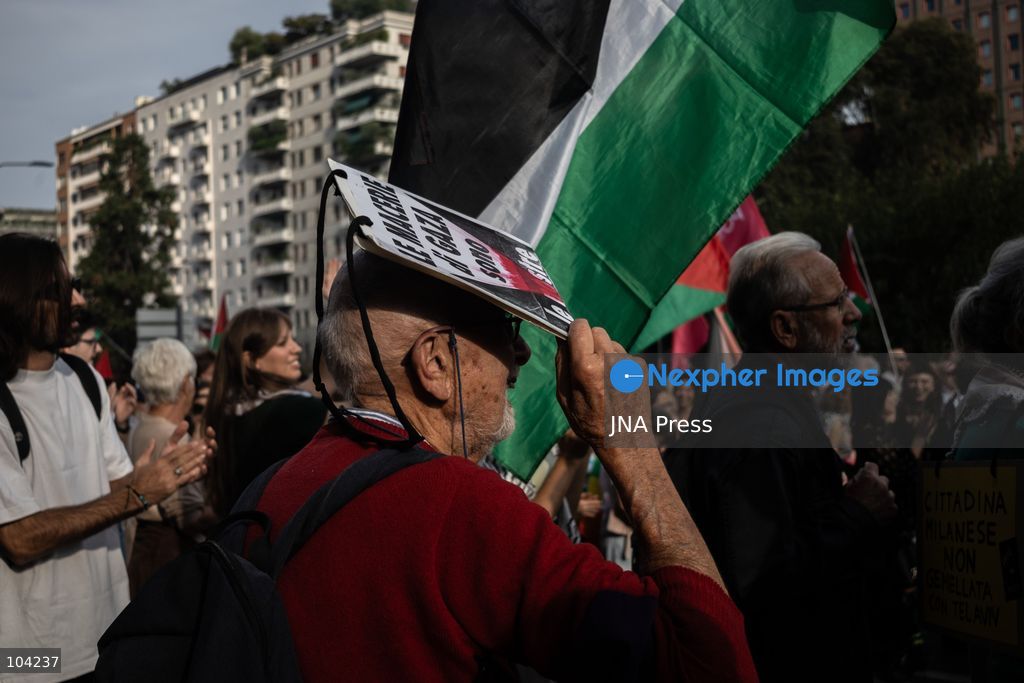 MILAN, ITALY, OCTOBER 10, 2026: Thousands of demonstrators march through central Milan in solidarity with Palestinians, marking three years since the start of the war in Gaza. Protesters carry Palestinian flags, banners and placards as they march from Piazza della Repubblica toward Piazza San Babila, calling for an end to Israel's military operations in Gaza, an arms embargo and the suspension of agreements with Israel. The demonstration was part of a nationwide mobilization organized by Palestinian groups and supporting organizations across Italy. Photo by Nadia Caimi / JNA Press. (Photo by Nadia Caimi/JNA Press via Nexpher Images)