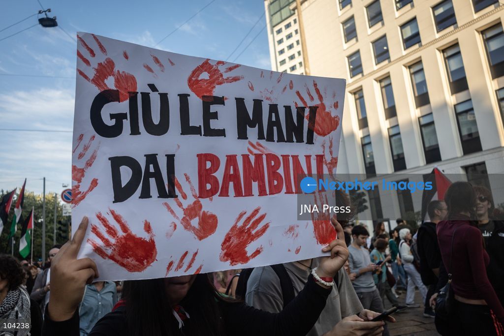 MILAN, ITALY, OCTOBER 10, 2026: Thousands of demonstrators march through central Milan in solidarity with Palestinians, marking three years since the start of the war in Gaza. Protesters carry Palestinian flags, banners and placards as they march from Piazza della Repubblica toward Piazza San Babila, calling for an end to Israel's military operations in Gaza, an arms embargo and the suspension of agreements with Israel. The demonstration was part of a nationwide mobilization organized by Palestinian groups and supporting organizations across Italy. Photo by Nadia Caimi / JNA Press. (Photo by Nadia Caimi/JNA Press via Nexpher Images)