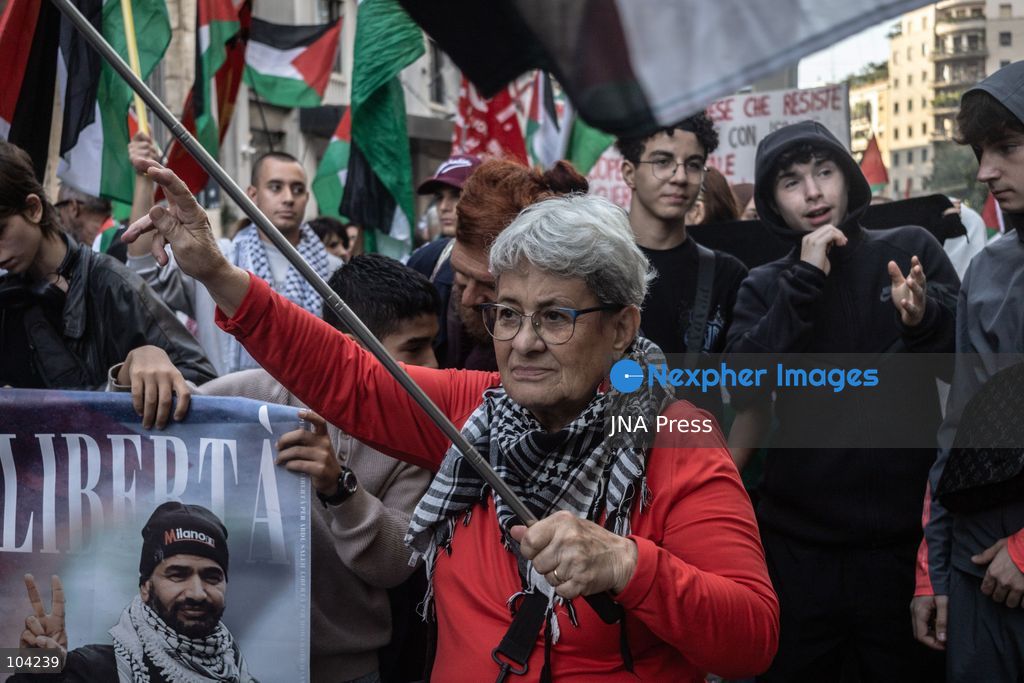 MILAN, ITALY, OCTOBER 10, 2026: Thousands of demonstrators march through central Milan in solidarity with Palestinians, marking three years since the start of the war in Gaza. Protesters carry Palestinian flags, banners and placards as they march from Piazza della Repubblica toward Piazza San Babila, calling for an end to Israel's military operations in Gaza, an arms embargo and the suspension of agreements with Israel. The demonstration was part of a nationwide mobilization organized by Palestinian groups and supporting organizations across Italy. Photo by Nadia Caimi / JNA Press. (Photo by Nadia Caimi/JNA Press via Nexpher Images)