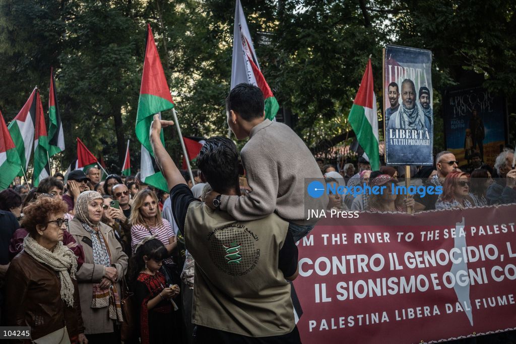 MILAN, ITALY, OCTOBER 10, 2026: Thousands of demonstrators march through central Milan in solidarity with Palestinians, marking three years since the start of the war in Gaza. Protesters carry Palestinian flags, banners and placards as they march from Piazza della Repubblica toward Piazza San Babila, calling for an end to Israel's military operations in Gaza, an arms embargo and the suspension of agreements with Israel. The demonstration was part of a nationwide mobilization organized by Palestinian groups and supporting organizations across Italy. Photo by Nadia Caimi / JNA Press. (Photo by Nadia Caimi/JNA Press via Nexpher Images)