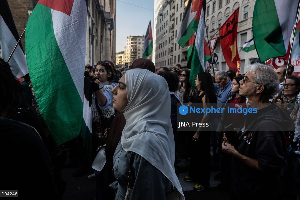 MILAN, ITALY, OCTOBER 10, 2026: Thousands of demonstrators march through central Milan in solidarity with Palestinians, marking three years since the start of the war in Gaza. Protesters carry Palestinian flags, banners and placards as they march from Piazza della Repubblica toward Piazza San Babila, calling for an end to Israel's military operations in Gaza, an arms embargo and the suspension of agreements with Israel. The demonstration was part of a nationwide mobilization organized by Palestinian groups and supporting organizations across Italy. Photo by Nadia Caimi / JNA Press. (Photo by Nadia Caimi/JNA Press via Nexpher Images)