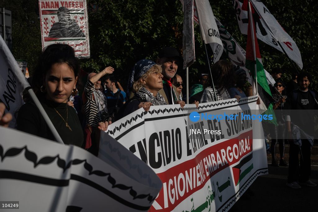 MILAN, ITALY, OCTOBER 10, 2026: Thousands of demonstrators march through central Milan in solidarity with Palestinians, marking three years since the start of the war in Gaza. Protesters carry Palestinian flags, banners and placards as they march from Piazza della Repubblica toward Piazza San Babila, calling for an end to Israel's military operations in Gaza, an arms embargo and the suspension of agreements with Israel. The demonstration was part of a nationwide mobilization organized by Palestinian groups and supporting organizations across Italy. Photo by Nadia Caimi / JNA Press. (Photo by Nadia Caimi/JNA Press via Nexpher Images)