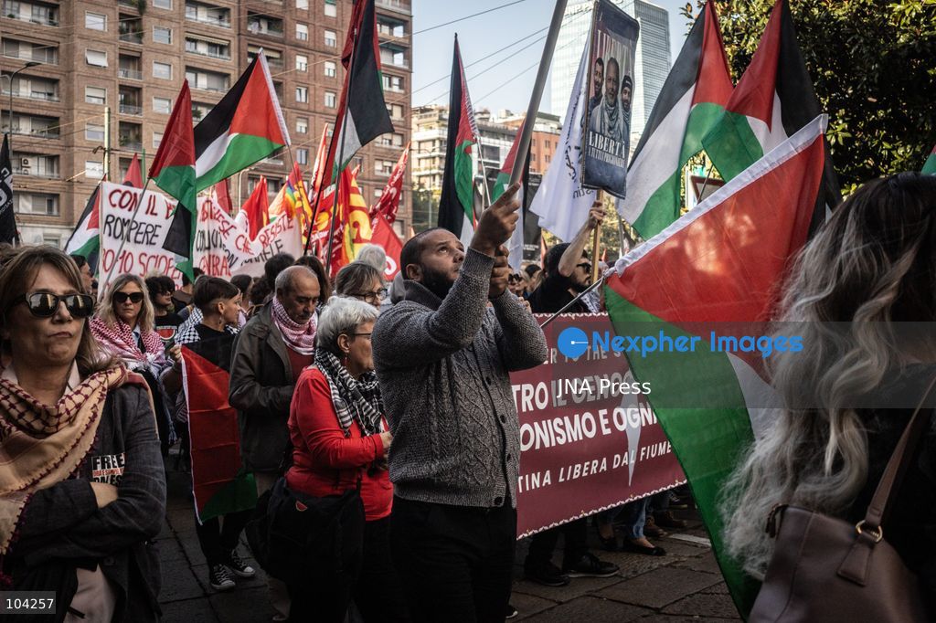 MILAN, ITALY, OCTOBER 10, 2026: Thousands of demonstrators march through central Milan in solidarity with Palestinians, marking three years since the start of the war in Gaza. Protesters carry Palestinian flags, banners and placards as they march from Piazza della Repubblica toward Piazza San Babila, calling for an end to Israel's military operations in Gaza, an arms embargo and the suspension of agreements with Israel. The demonstration was part of a nationwide mobilization organized by Palestinian groups and supporting organizations across Italy. Photo by Nadia Caimi / JNA Press. (Photo by Nadia Caimi/JNA Press via Nexpher Images)