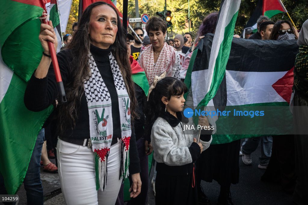 MILAN, ITALY, OCTOBER 10, 2026: Thousands of demonstrators march through central Milan in solidarity with Palestinians, marking three years since the start of the war in Gaza. Protesters carry Palestinian flags, banners and placards as they march from Piazza della Repubblica toward Piazza San Babila, calling for an end to Israel's military operations in Gaza, an arms embargo and the suspension of agreements with Israel. The demonstration was part of a nationwide mobilization organized by Palestinian groups and supporting organizations across Italy. Photo by Nadia Caimi / JNA Press. (Photo by Nadia Caimi/JNA Press via Nexpher Images)