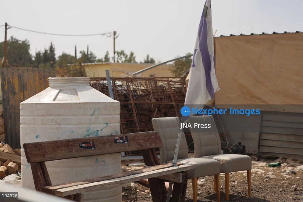 UMM AL-KHAIR, MASAFER YATTA, OCCUPIED WEST BANK, OCTOBER 11, 2026: Israeli settlers placed barbed wire in the sheep pen yard and plastic sheets in front of the windows of the Salem al-Hathaleen family home in Umm al-Khair, Masafer Yatta, south of Hebron. The Israeli military subsequently declared the area a closed military zone, preventing the family from accessing the sheep pen and backyard, where a newly established settler outpost is located. Photo by Mosab Shawer / JNA Press. (Photo by Mosab shawer/JNA Press via Nexpher Images)