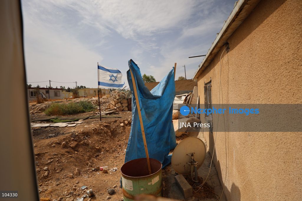 UMM AL-KHAIR, MASAFER YATTA, OCCUPIED WEST BANK, OCTOBER 11, 2026: Israeli settlers placed barbed wire in the sheep pen yard and plastic sheets in front of the windows of the Salem al-Hathaleen family home in Umm al-Khair, Masafer Yatta, south of Hebron. The Israeli military subsequently declared the area a closed military zone, preventing the family from accessing the sheep pen and backyard, where a newly established settler outpost is located. Photo by Mosab Shawer / JNA Press. (Photo by Mosab shawer/JNA Press via Nexpher Images)