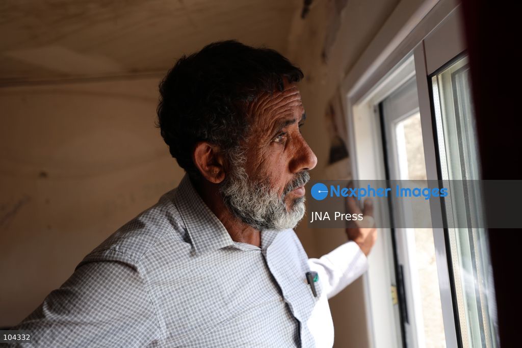 UMM AL-KHAIR, MASAFER YATTA, OCCUPIED WEST BANK, OCTOBER 11, 2026: Israeli settlers placed barbed wire in the sheep pen yard and plastic sheets in front of the windows of the Salem al-Hathaleen family home in Umm al-Khair, Masafer Yatta, south of Hebron. The Israeli military subsequently declared the area a closed military zone, preventing the family from accessing the sheep pen and backyard, where a newly established settler outpost is located. Photo by Mosab Shawer / JNA Press. (Photo by Mosab shawer/JNA Press via Nexpher Images)