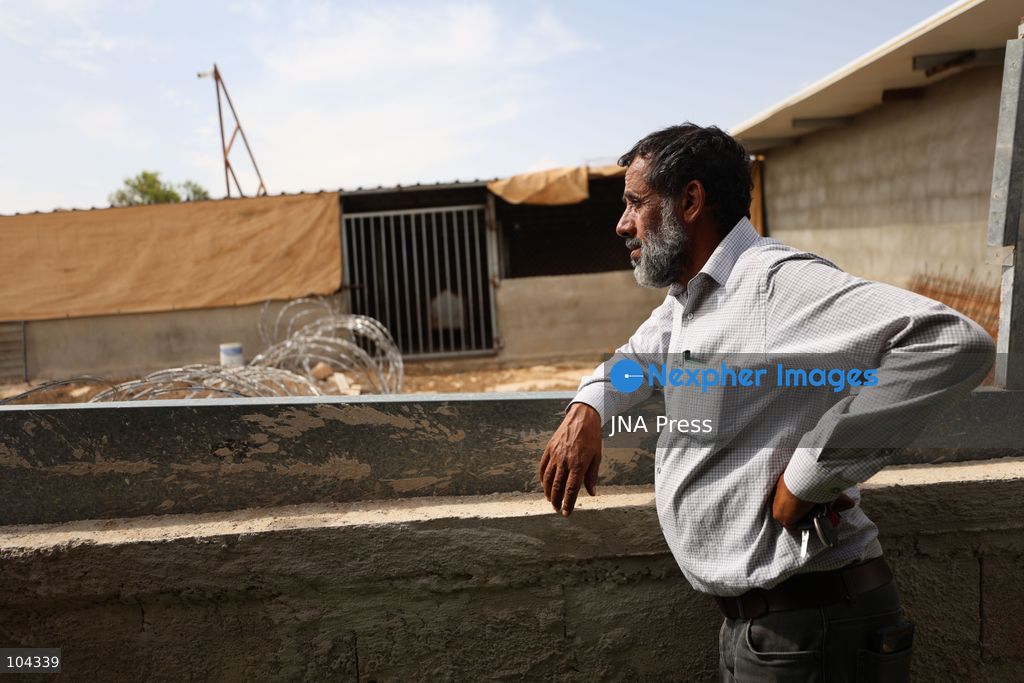 UMM AL-KHAIR, MASAFER YATTA, OCCUPIED WEST BANK, OCTOBER 11, 2026: Israeli settlers placed barbed wire in the sheep pen yard and plastic sheets in front of the windows of the Salem al-Hathaleen family home in Umm al-Khair, Masafer Yatta, south of Hebron. The Israeli military subsequently declared the area a closed military zone, preventing the family from accessing the sheep pen and backyard, where a newly established settler outpost is located. Photo by Mosab Shawer / JNA Press. (Photo by Mosab shawer/JNA Press via Nexpher Images)