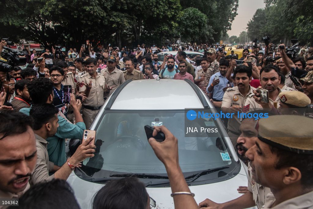 NEW DELHI, INDIA, OCTOBER 11, 2026: Police detain protesters during a demonstration at Connaught Place in New Delhi demanding the resignation of India's Chief Election Commissioner Gyanesh Kumar. The protests follow opposition allegations of irregularities in voter roll revisions, which the Election Commission denies. Photo by Amit Shukla / JNA Press. (Photo by Amit shukla/JNA Press via Nexpher Images)
