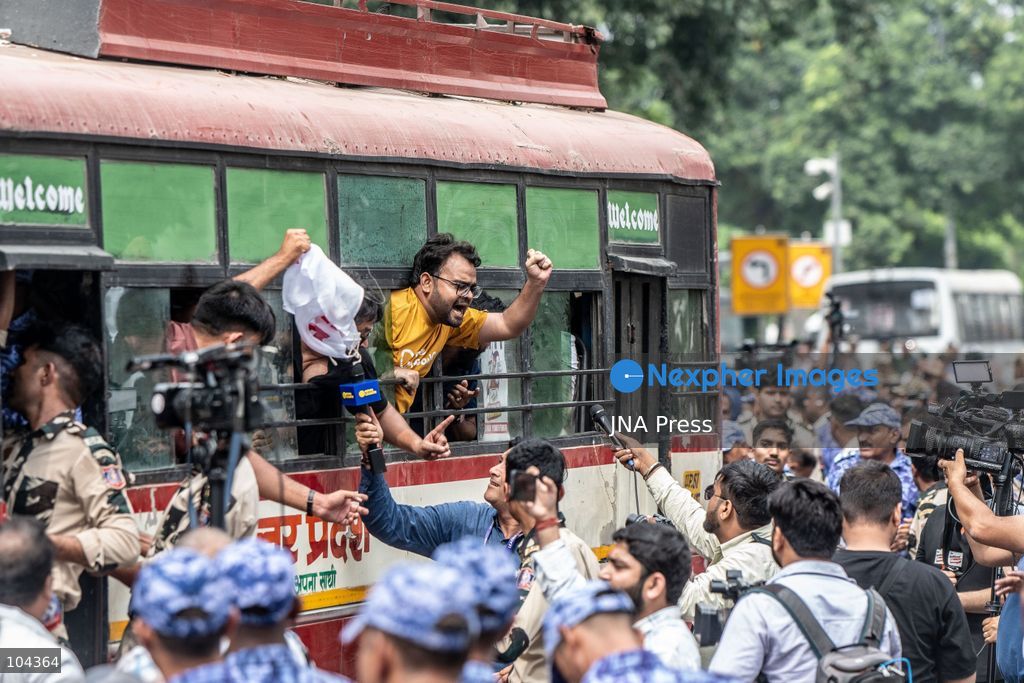 NEW DELHI, INDIA, OCTOBER 11, 2026: Police detain protesters during a demonstration at Connaught Place in New Delhi demanding the resignation of India's Chief Election Commissioner Gyanesh Kumar. The protests follow opposition allegations of irregularities in voter roll revisions, which the Election Commission denies. Photo by Amit Shukla / JNA Press. (Photo by Amit shukla/JNA Press via Nexpher Images)