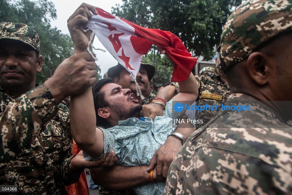 NEW DELHI, INDIA, OCTOBER 11, 2026: Police detain protesters during a demonstration at Connaught Place in New Delhi demanding the resignation of India's Chief Election Commissioner Gyanesh Kumar. The protests follow opposition allegations of irregularities in voter roll revisions, which the Election Commission denies. Photo by Amit Shukla / JNA Press. (Photo by Amit shukla/JNA Press via Nexpher Images)
