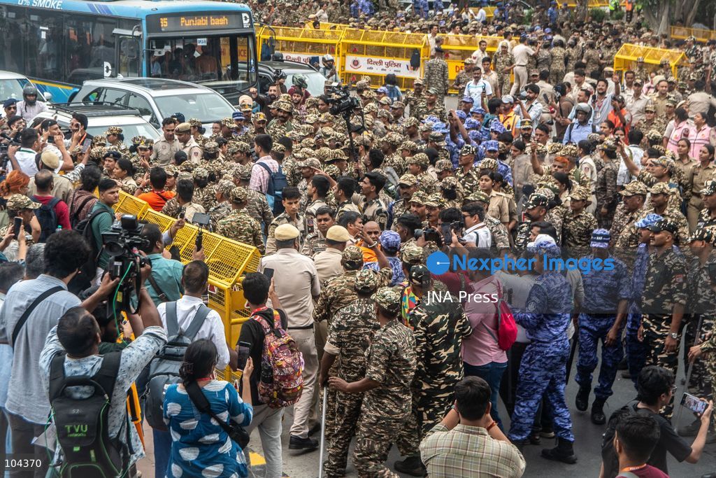 NEW DELHI, INDIA, OCTOBER 11, 2026: Police detain protesters during a demonstration at Connaught Place in New Delhi demanding the resignation of India's Chief Election Commissioner Gyanesh Kumar. The protests follow opposition allegations of irregularities in voter roll revisions, which the Election Commission denies. Photo by Amit Shukla / JNA Press. (Photo by Amit shukla/JNA Press via Nexpher Images)