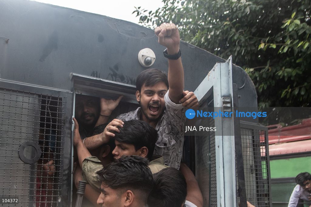 NEW DELHI, INDIA, OCTOBER 11, 2026: Police detain protesters during a demonstration at Connaught Place in New Delhi demanding the resignation of India's Chief Election Commissioner Gyanesh Kumar. The protests follow opposition allegations of irregularities in voter roll revisions, which the Election Commission denies. Photo by Amit Shukla / JNA Press. (Photo by Amit shukla/JNA Press via Nexpher Images)