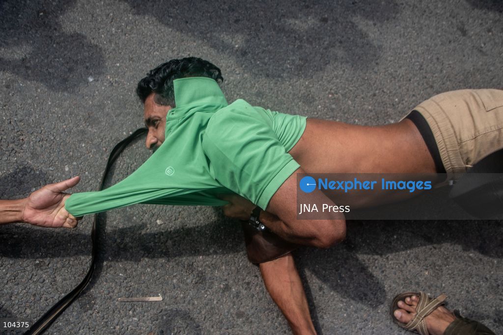 NEW DELHI, INDIA, OCTOBER 11, 2026: Police detain protesters during a demonstration at Connaught Place in New Delhi demanding the resignation of India's Chief Election Commissioner Gyanesh Kumar. The protests follow opposition allegations of irregularities in voter roll revisions, which the Election Commission denies. Photo by Amit Shukla / JNA Press. (Photo by Amit shukla/JNA Press via Nexpher Images)
