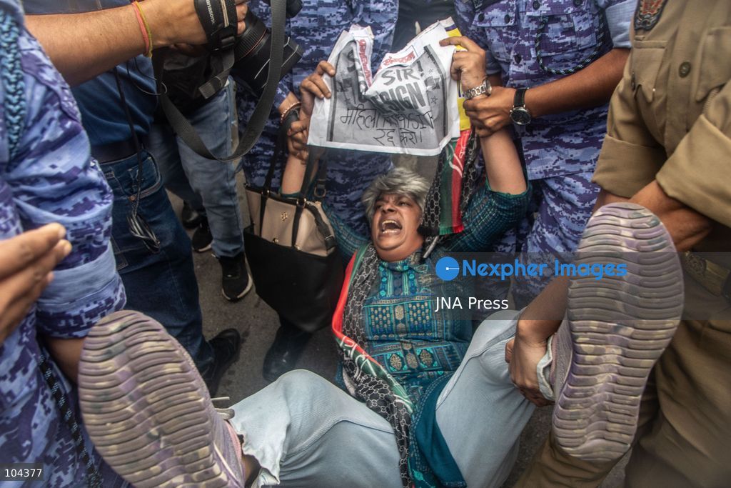 NEW DELHI, INDIA, OCTOBER 11, 2026: Police detain protesters during a demonstration at Connaught Place in New Delhi demanding the resignation of India's Chief Election Commissioner Gyanesh Kumar. The protests follow opposition allegations of irregularities in voter roll revisions, which the Election Commission denies. Photo by Amit Shukla / JNA Press. (Photo by Amit shukla/JNA Press via Nexpher Images)