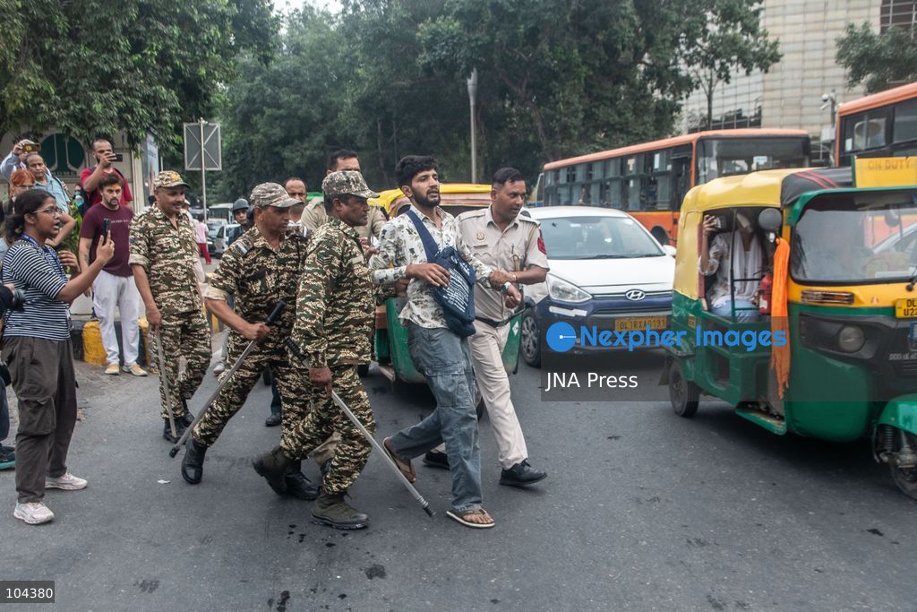 NEW DELHI, INDIA, OCTOBER 11, 2026: Police detain protesters during a demonstration at Connaught Place in New Delhi demanding the resignation of India's Chief Election Commissioner Gyanesh Kumar. The protests follow opposition allegations of irregularities in voter roll revisions, which the Election Commission denies. Photo by Amit Shukla / JNA Press. (Photo by Amit shukla/JNA Press via Nexpher Images)
