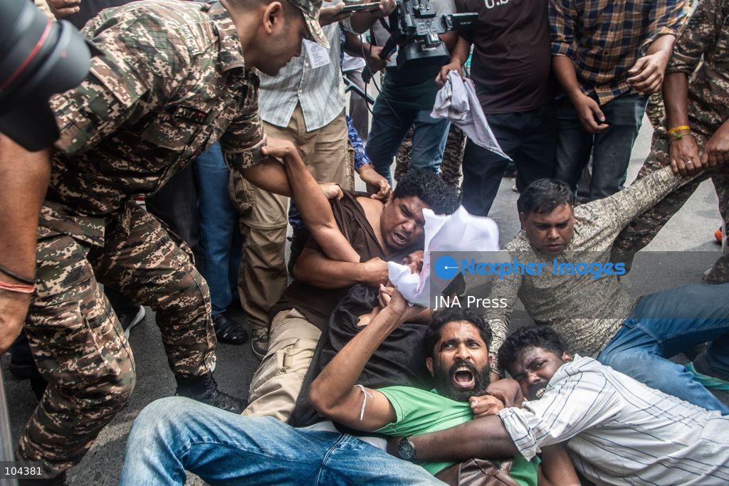 NEW DELHI, INDIA, OCTOBER 11, 2026: Police detain protesters during a demonstration at Connaught Place in New Delhi demanding the resignation of India's Chief Election Commissioner Gyanesh Kumar. The protests follow opposition allegations of irregularities in voter roll revisions, which the Election Commission denies. Photo by Amit Shukla / JNA Press. (Photo by Amit shukla/JNA Press via Nexpher Images)