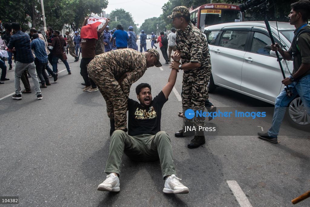 NEW DELHI, INDIA, OCTOBER 11, 2026: Police detain protesters during a demonstration at Connaught Place in New Delhi demanding the resignation of India's Chief Election Commissioner Gyanesh Kumar. The protests follow opposition allegations of irregularities in voter roll revisions, which the Election Commission denies. Photo by Amit Shukla / JNA Press. (Photo by Amit shukla/JNA Press via Nexpher Images)