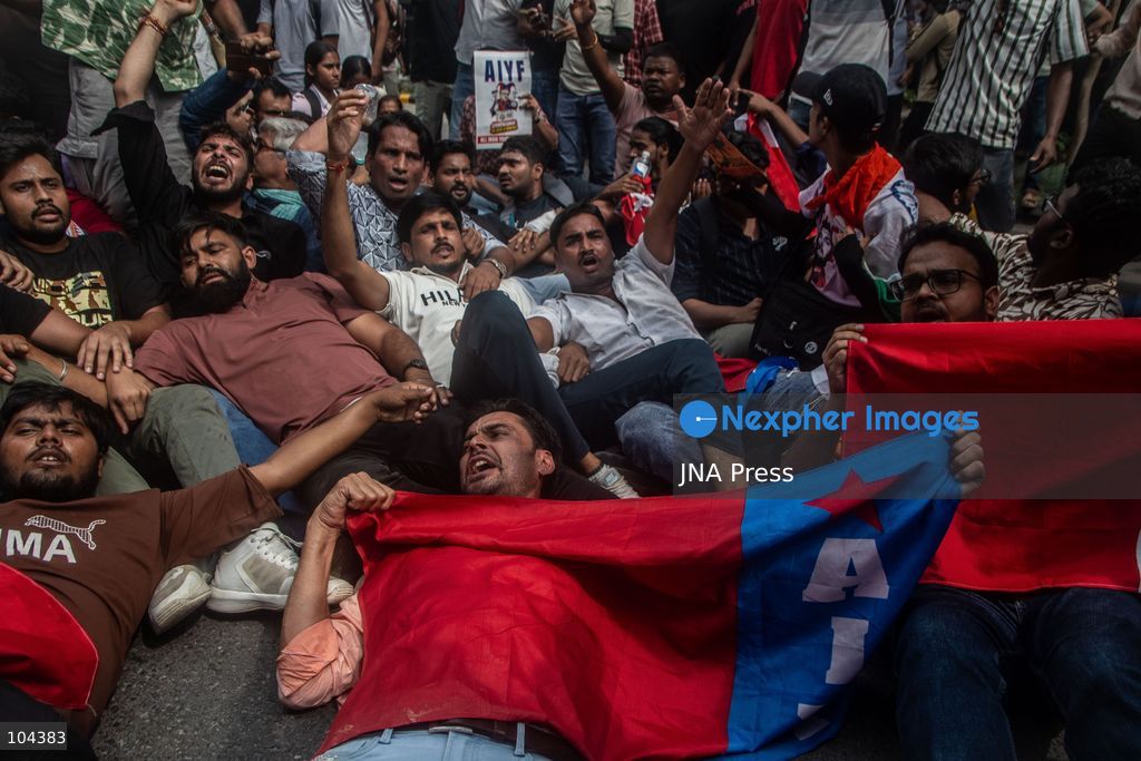 NEW DELHI, INDIA, OCTOBER 11, 2026: Police detain protesters during a demonstration at Connaught Place in New Delhi demanding the resignation of India's Chief Election Commissioner Gyanesh Kumar. The protests follow opposition allegations of irregularities in voter roll revisions, which the Election Commission denies. Photo by Amit Shukla / JNA Press. (Photo by Amit shukla/JNA Press via Nexpher Images)