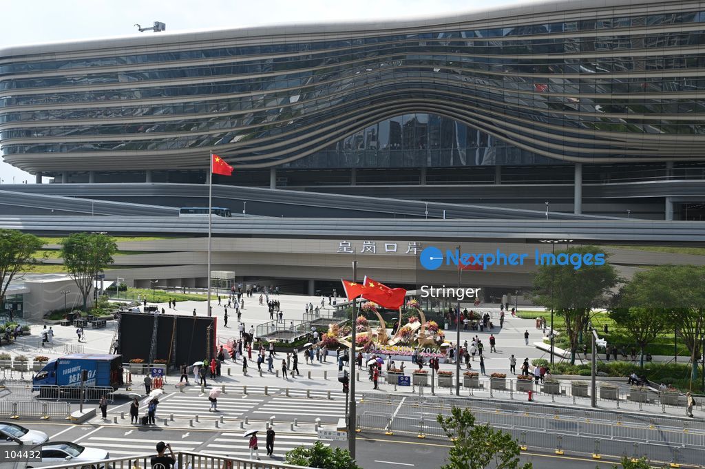 People walking outside of Huanggang Port on October 12, 2026 in Shenzhen, China. Huanggang Port officially opened for operation today. (Photo by Stringer/Nexpher Images)