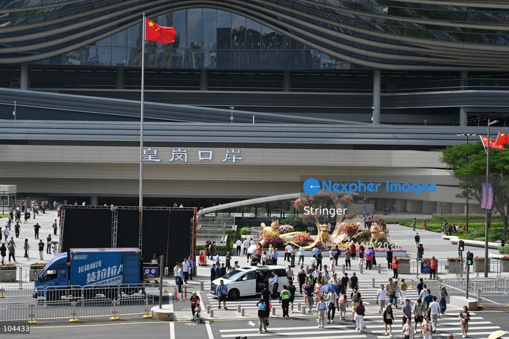 People walking outside of Huanggang Port on October 12, 2026 in Shenzhen, China. Huanggang Port officially opened for operation today. (Photo by Stringer/Nexpher Images)
