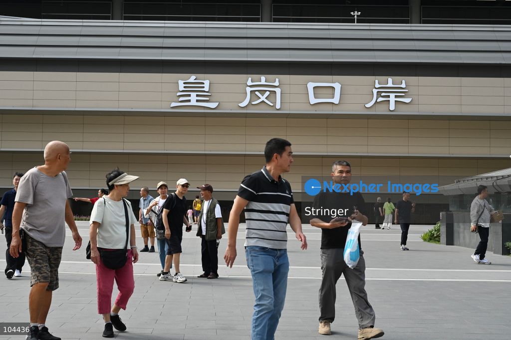 People walking outside of Huanggang Port on October 12, 2026 in Shenzhen, China. Huanggang Port officially opened for operation today. (Photo by Stringer/Nexpher Images)