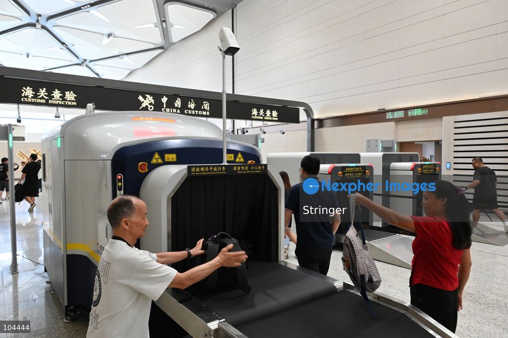 Tourists' baggage going through security check at Huanggang Port on October 12, 2026 in Shenzhen, China. Huanggang Port officially opened for operation today. (Photo by Stringer/Nexpher Images)