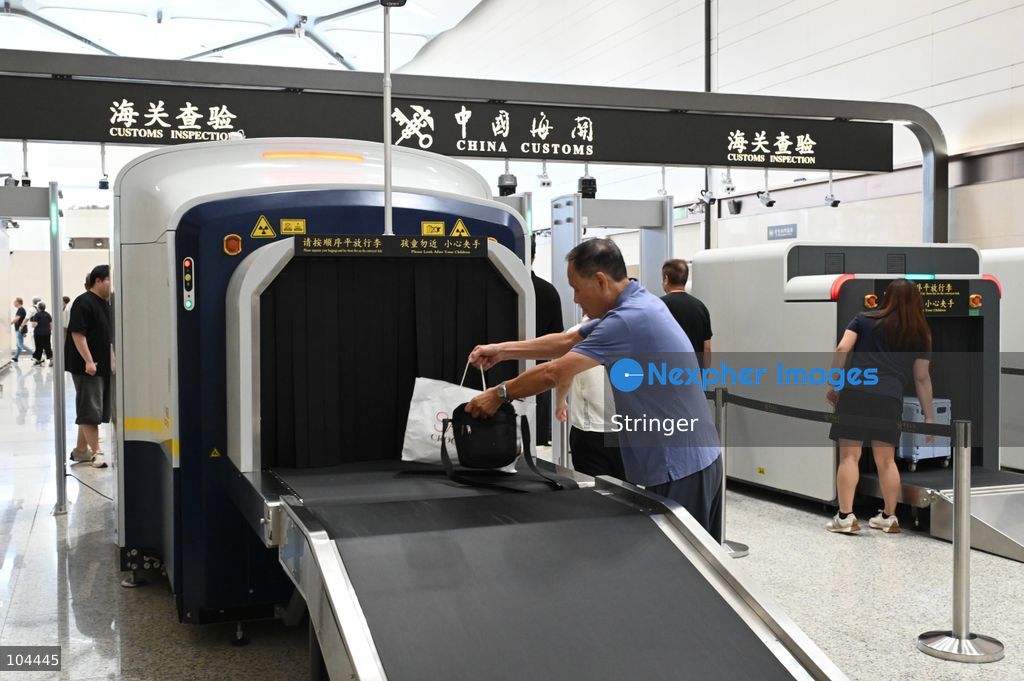 Tourists' baggage going through security check at Huanggang Port on October 12, 2026 in Shenzhen, China. Huanggang Port officially opened for operation today. (Photo by Stringer/Nexpher Images)