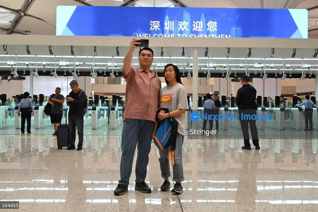 Tourists posing photo at Huanggang Port on October 12, 2026 in Shenzhen, China. Huanggang Port officially opened for operation today. (Photo by Stringer/Nexpher Images)