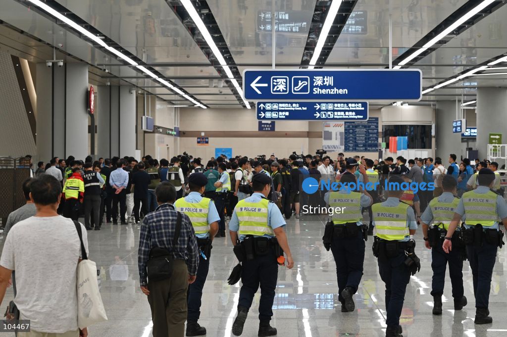Hong Kong polices working at Huanggang Port on October 12, 2026 in Shenzhen, China. Huanggang Port officially opened for operation today. (Photo by Stringer/Nexpher Images)