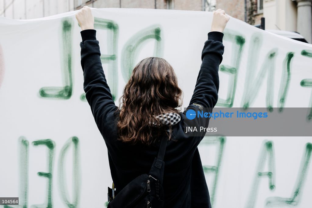 TURIN, ITALY, OCTOBER 10, 2026: A young woman holds up a banner opposing Israeli policies towards Palestinians, shortly before the start of the regional demonstration in support of Palestine. Photo by Luca Prestia / JNA Press (Photo by Luca Prestia/JNA Press via Nexpher Images)