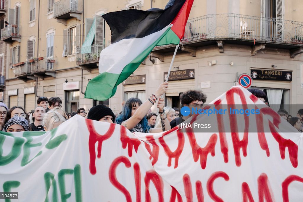 TURIN, ITALY, OCTOBER 10, 2026: A young woman holds a Palestinian flag during a regional demonstration in support of Palestine that marched through the streets of Turin. Photo by Luca Prestia / JNA Press (Photo by Luca Prestia/JNA Press via Nexpher Images)
