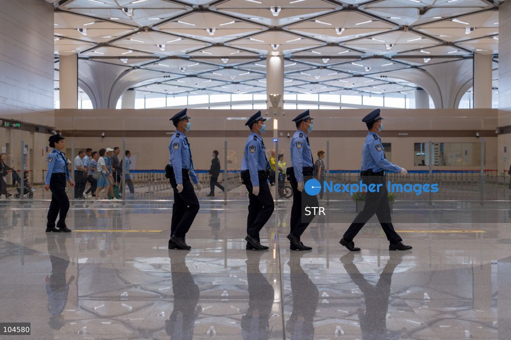 Officers marching near the border control checkpoint to shenzhen in Huanggang Port on October 12, 2026 in Shenzhen, China. (Photo by STR/Nexpher Images)