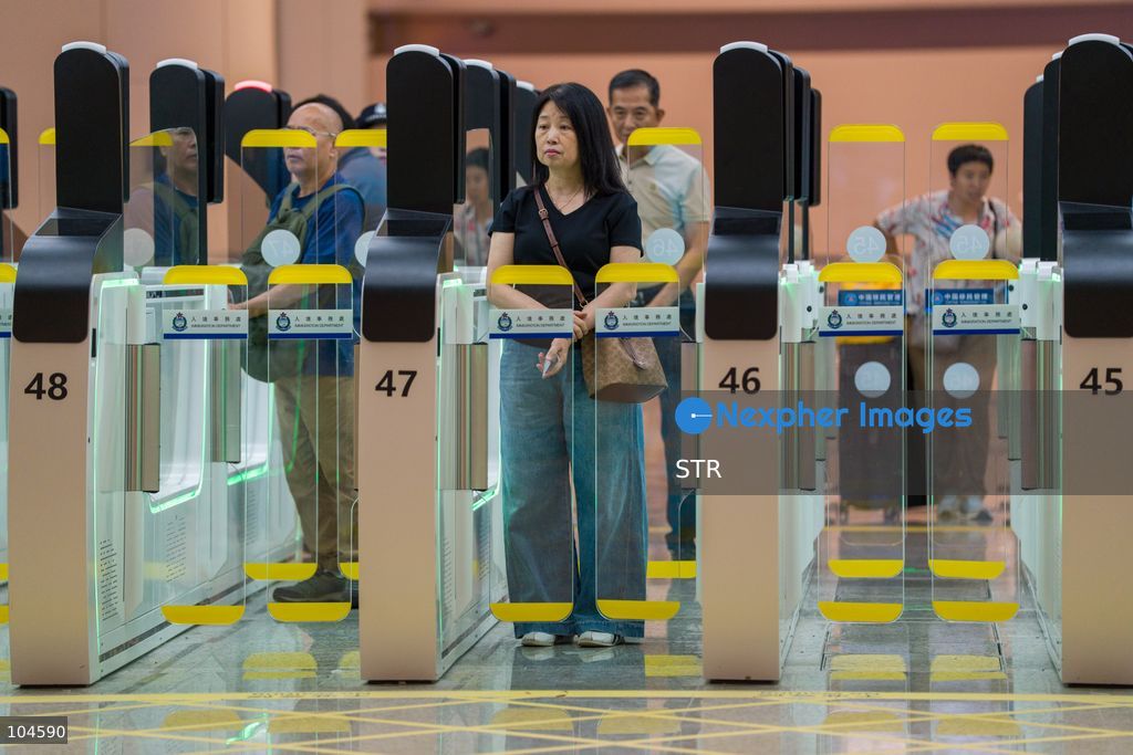 A women crossing an automated border control to the Hong Kong side inside Huanggang Port on October 12, 2026 in Shenzhen, China. (Photo by STR/Nexpher Images)