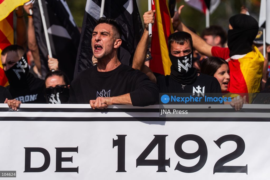 BARCELONA, SPAIN, OCTOBER 12, 2026: Demonstrators march along Passeig de Gracia in central Barcelona, waving Spanish flags during a rally marking Spain's National Day. Organised by the Unidos por Ceuta platform, the march expresses support for Ceuta and Spanish national unity. Participants include representatives and supporters of the Partido Popular (PP) and Vox, as well as members of the far-right group Nucleo Nacional. Photo by Marc Asensio Clupes / JNA Press. (Photo by Marc Asensio Clupes/JNA Press via Nexpher Images)